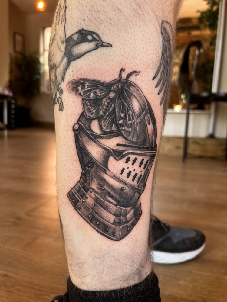 Knight's helmet with a moth, by Ethan