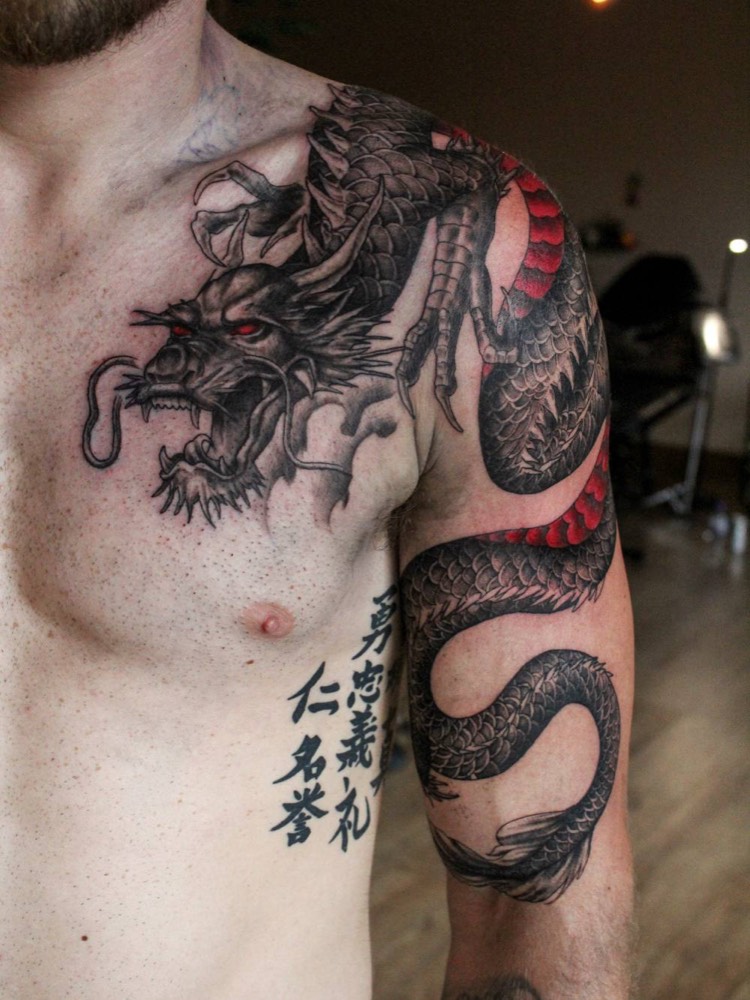 Dragon wrapping over a shoulder and chest