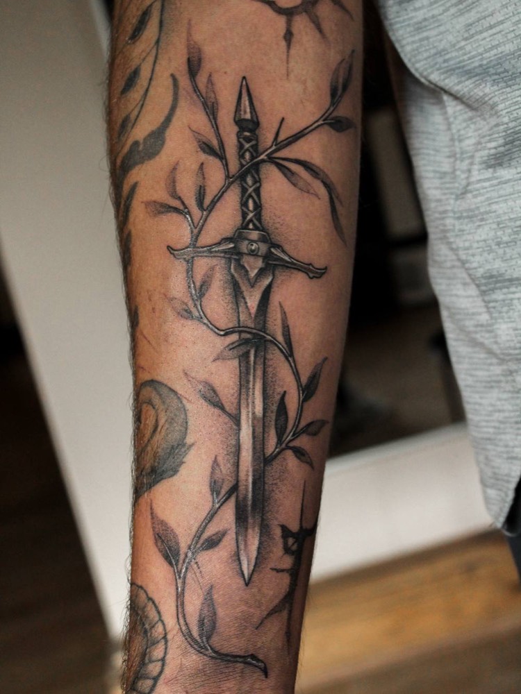 Sword with vines and leaves